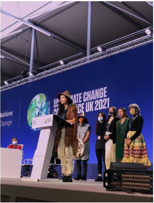 SustainUS COP26 Delegation standing in solidarity with Ta'Kaiya Blaney from the Salish Sea at the final People's Plenary